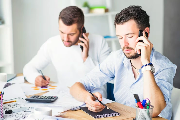 Tax professionals reviewing GST HST and sales tax filings and business records for compliance
