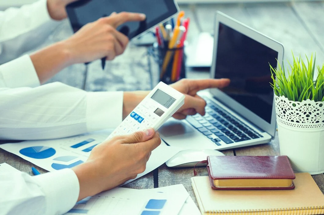Accountants reviewing GST compliance and bookkeeping records for Ontario service based businesses